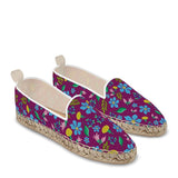 Espadrilles shoes with wild flowers on dark purple