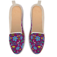 Espadrilles shoes with wild flowers on dark purple