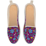Espadrilles shoes with wild flowers on dark purple